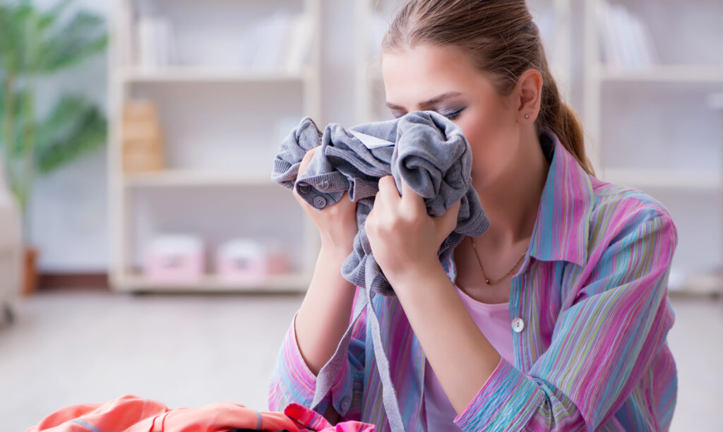 clothes smell sweaty even after washing